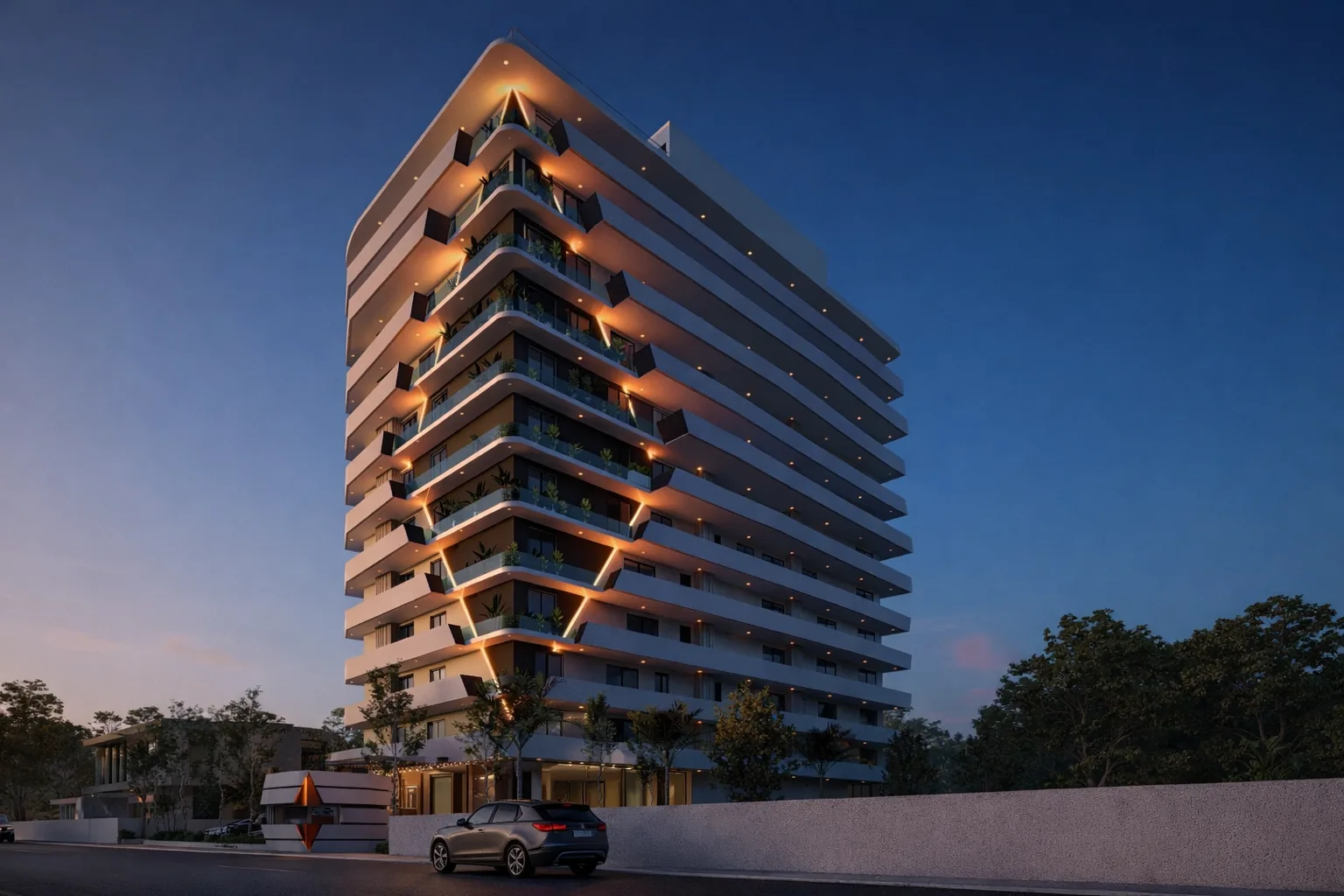 Prime Accra residential tower in Airport Residential Area, Accra, seen from the street corner at dusk with its balconies and facade accent lit against a deep blue sky